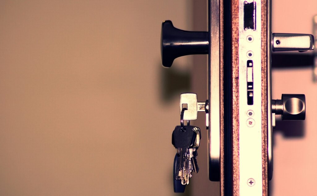 Detailed view of a door lock and keys emphasizing security and access.